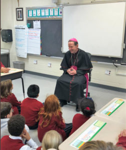 Bishop Burbidge talking to students in classroom