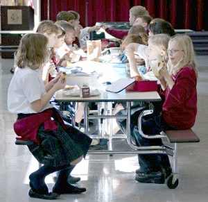 students eating lunch in lunchroom